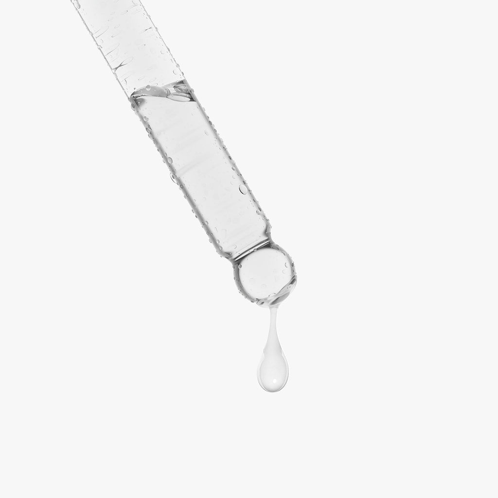 Applying Fapzlee Snail Mucin Face Serum to skin
